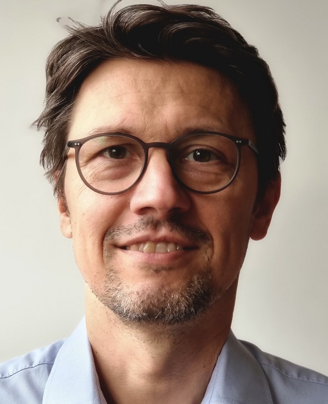 Porträt von Christian Herzig. Klick führt zu Großansicht in neuem Fenster.